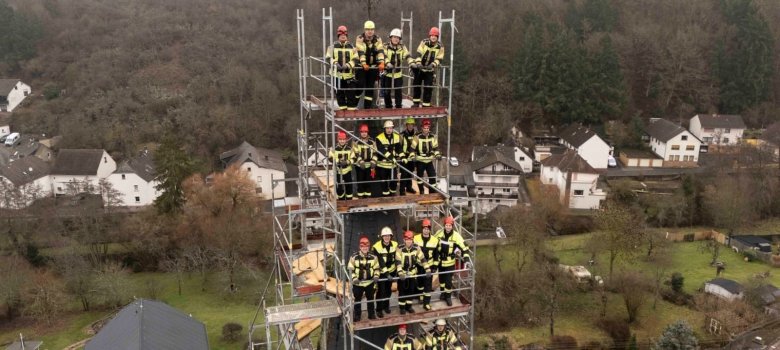 Gruppenfoto auf dem Gerüst
